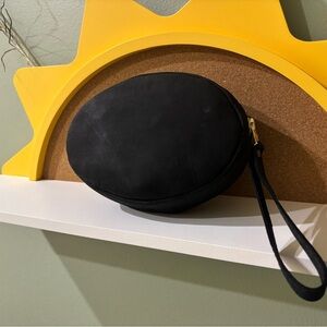 Elegant Roswell Pouch wristlet Large with brass accents.